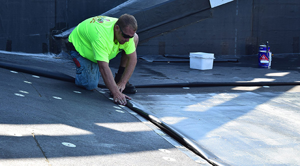 single-ply membrane being installed