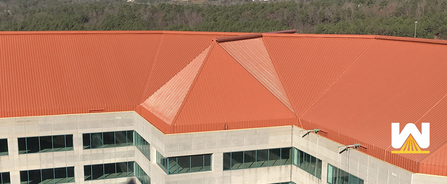 silicone roof coating system installed on high rise in Alabama