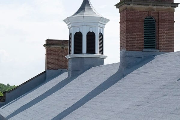Finished spray foam roof over a shingle roof at John Muir Elementary