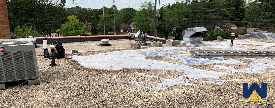 repair or replace commercial roof
