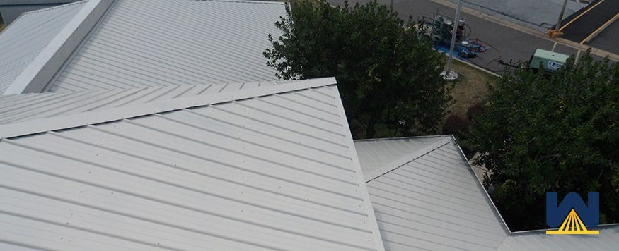 silicone coating over a metal roof
