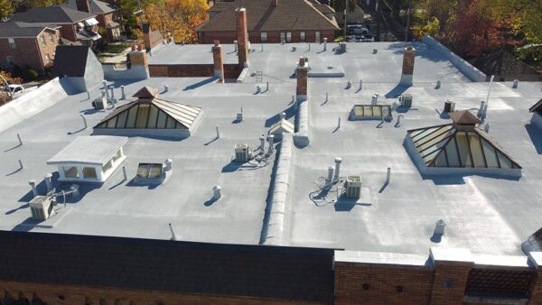 spray foam over a roof with lots of penetrations