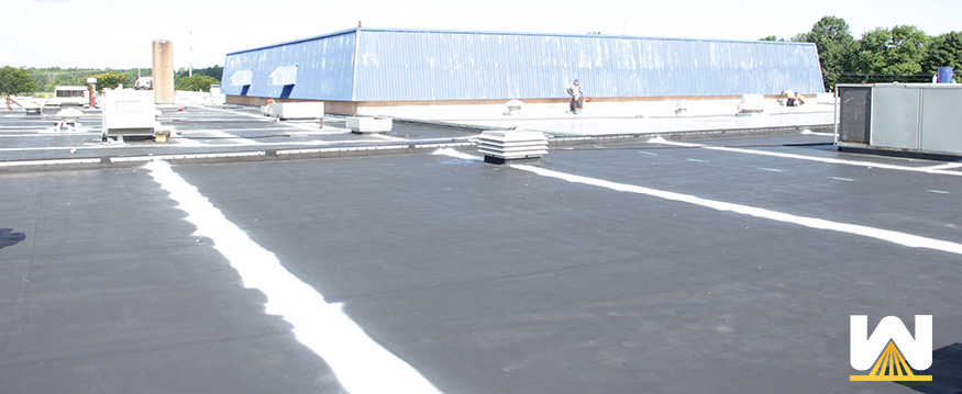 EPDM roof restored with silicone roof coating system