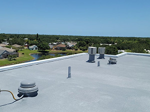 Hotel - Melbourne - spray foam roofing over an existing TPO roof