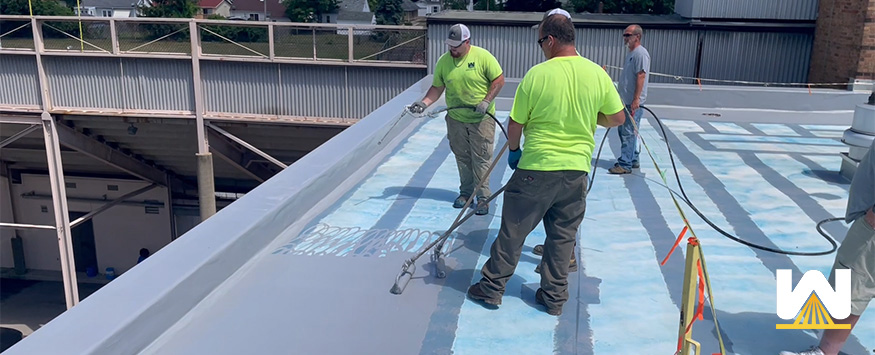 Roof coating system over TPO