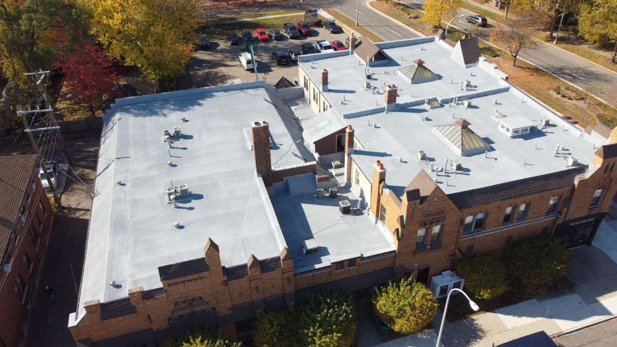 Featured image for “Maryland Court – Spray Foam over Smooth BUR Roof Restoration”