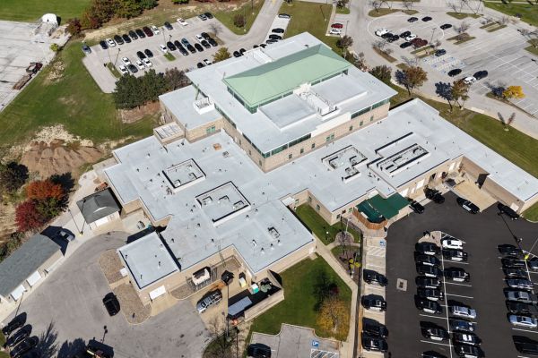 Finished coating with embedded granules at Parma Police Station roof