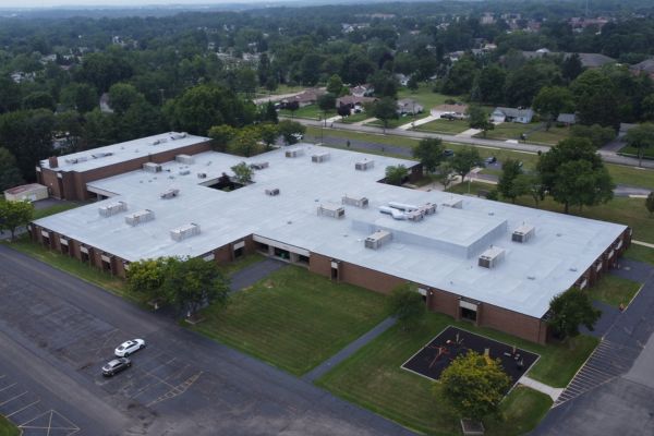 Spray foam over existing gravel built up roof at Heskett Middle School in Bedford Heights, Ohio