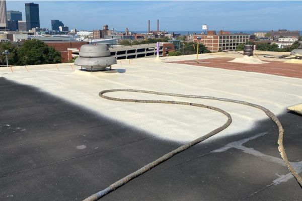 Spray foam roofing installed over an existing smooth modified bitumen in Cleveland, Ohio
