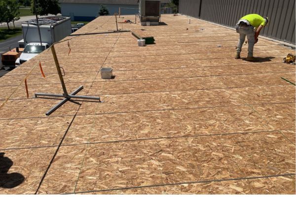 Plywood installed in-between metal panels.