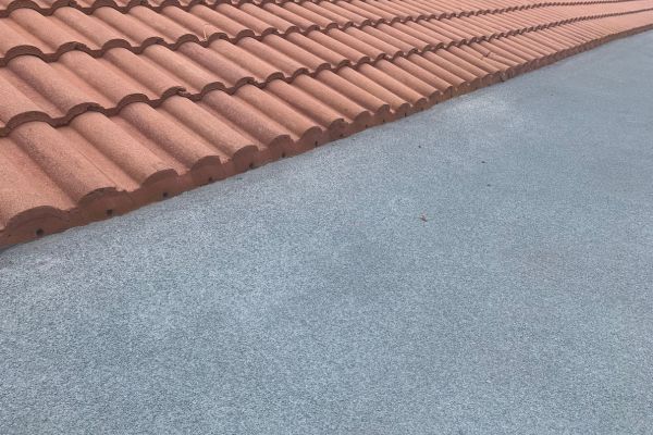 Finished spray foam roof at Peppertree Condos. See how the foam goes right up to the clay.