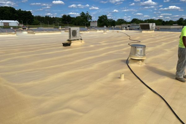 In-progress photo of the spray foam roofing installation at Mercer County Career Center in PA.