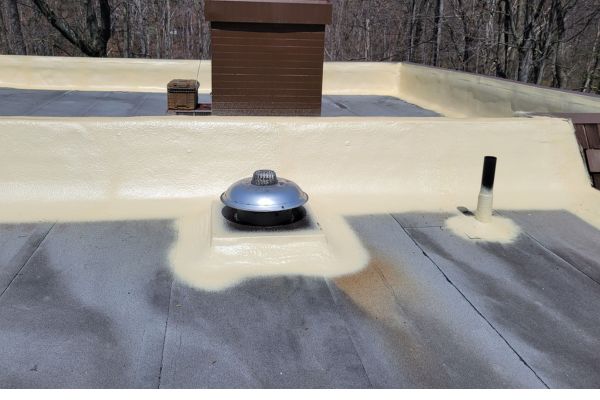 Spray Foam application across roof and up parapet walls. Granger lakes.  Northeast Ohio.