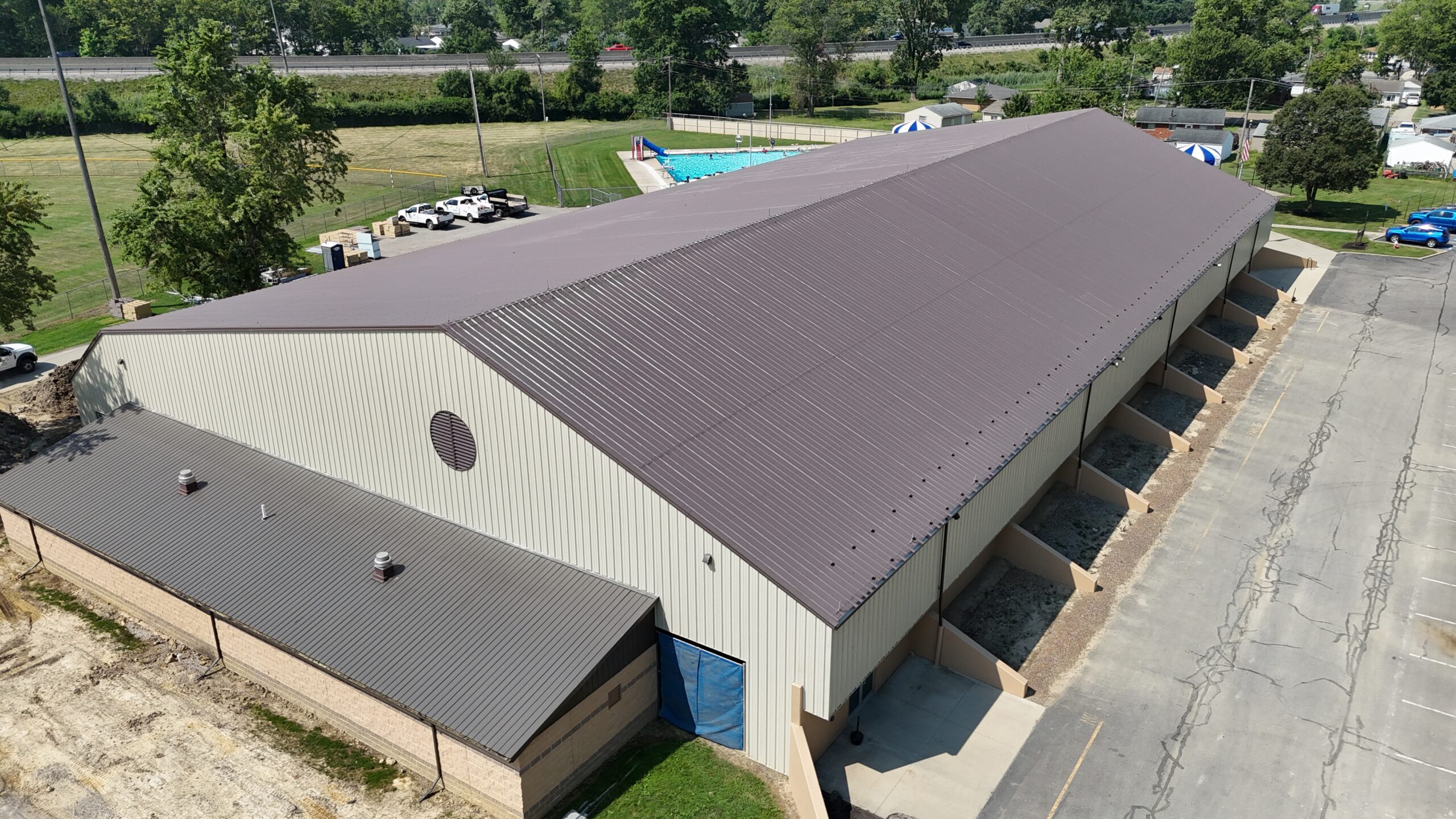 Silicone roof coating system over metal at Elyria Ice Rink in Elyria, Ohio