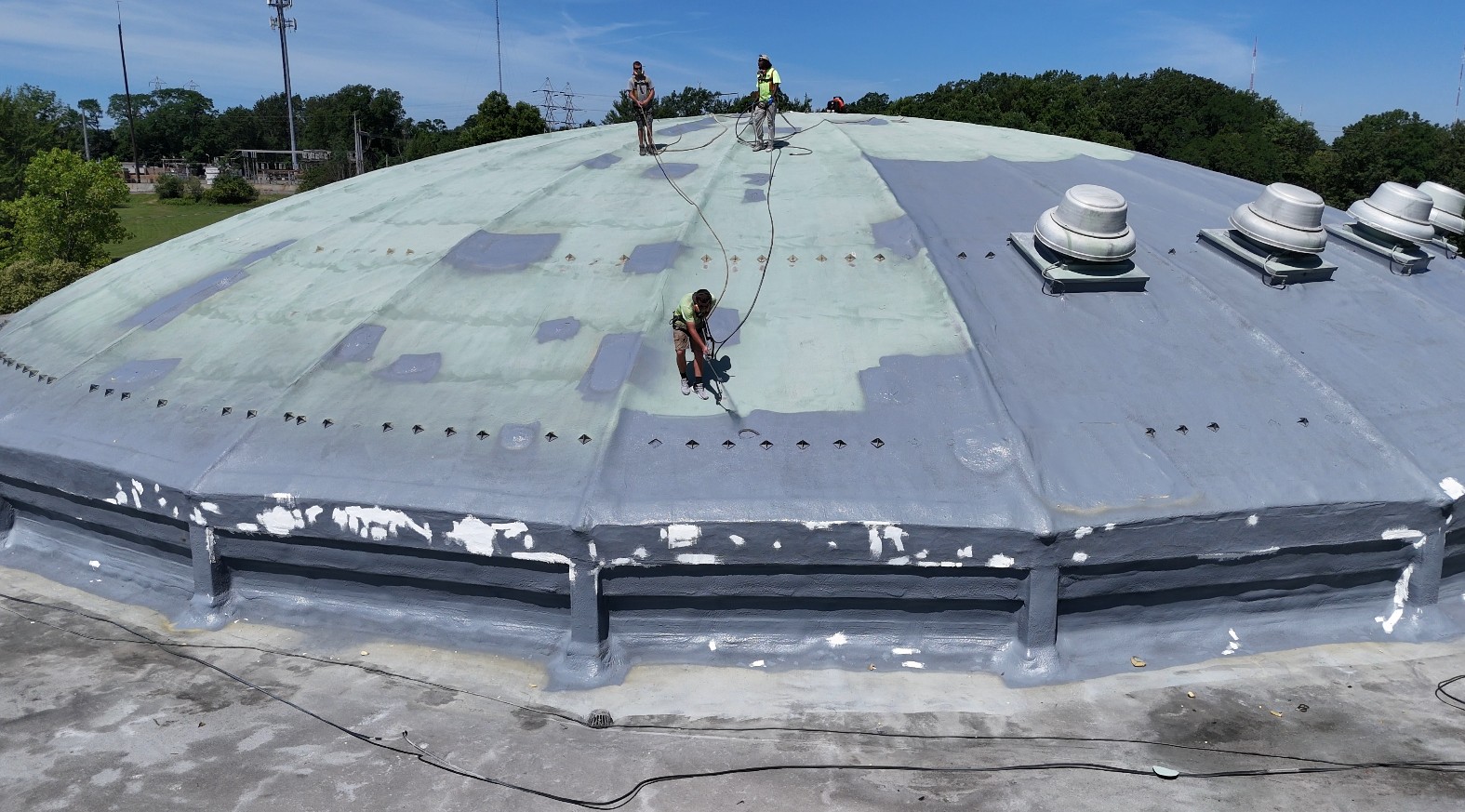 Installing silicone coating at Normandy High School in Parma, Ohio