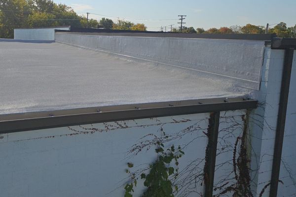 A spray foam roofing system installed in 2025 in Lorain, Ohio over an existing EPDM roof.