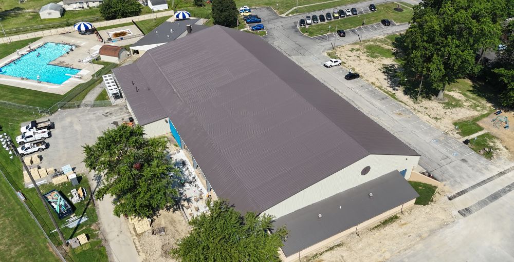 Finished drone footage of Elyria Ice Rink - a silicone roof coating system installed over an existing metal roof