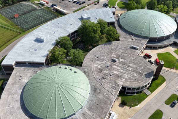 Image of a finished spray foam roofing recoat installed at Normandy High School in 2025
