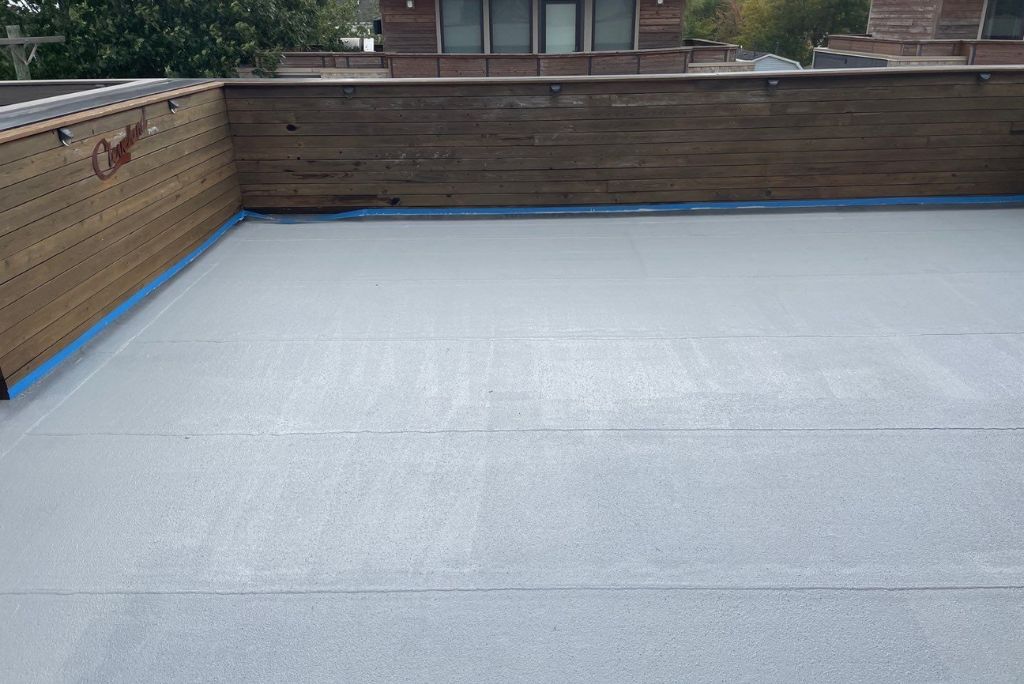 Commercial Roofing Condo in Cleveland Ohio - roof coating system over granulated modified bitumen