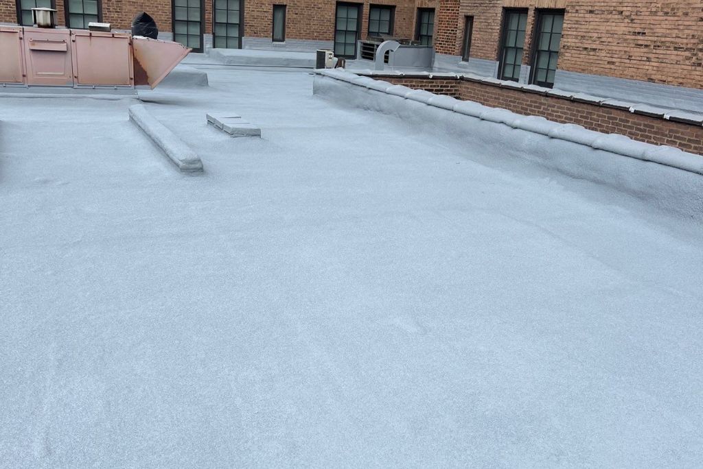 Commercial Roofing Project Completed in Cleveland Ohio - Spray Foam over Gravel Built Up