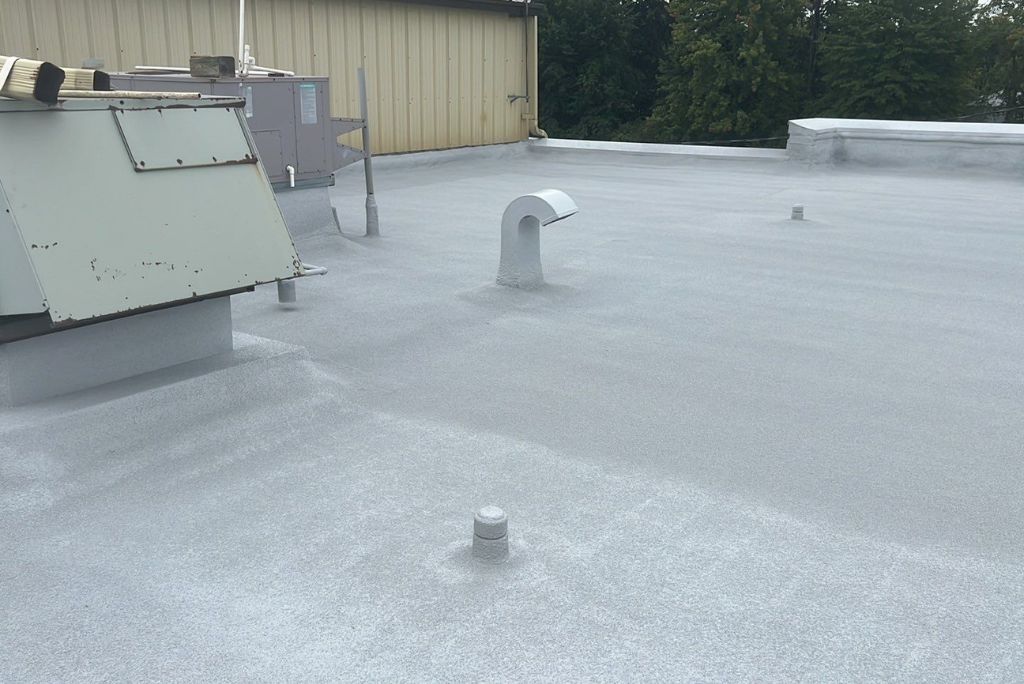 Commercial EPDM Roof Restored with Spray Foam in Elyria, Ohio