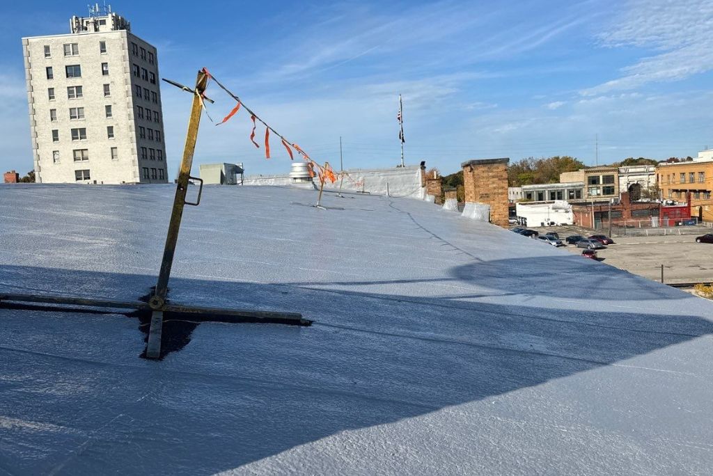 Commercial Granulated Modified Bitumen Roof in Elyria, Ohio Restored with Silicone Roof Coatings