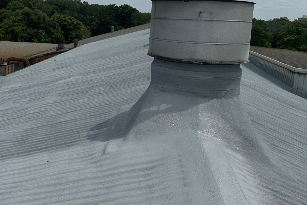 Commercial Metal Roof - Elyria Foundry - Restored with Spray Foam Roofing