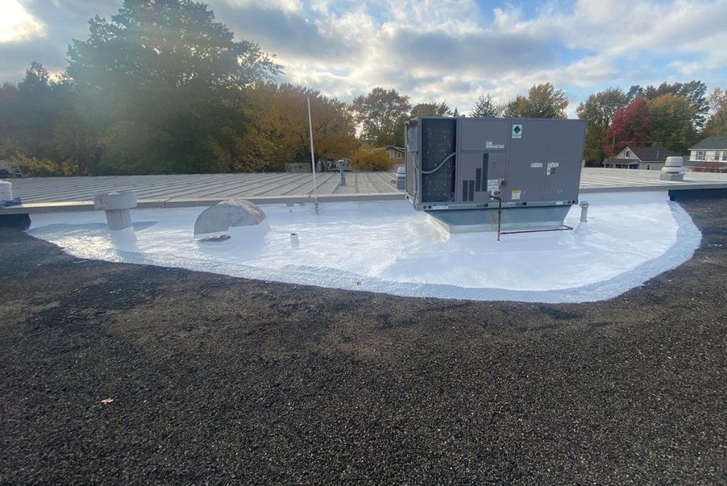 Commercial Roof Repair in Elyria, Ohio - Spray Foam over Gravel Built-up