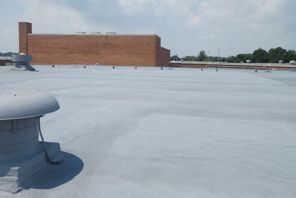 Commercial Roofing Sandusky - A spray foam roofing recoat performed on Sandusky High School