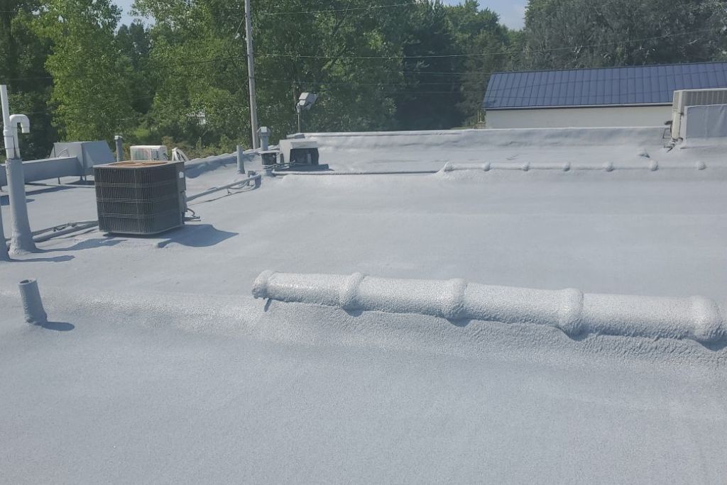 Finished Photo of a Commercial Metal Roof in Elyria, Ohio Restored With Spray Foam Roofing