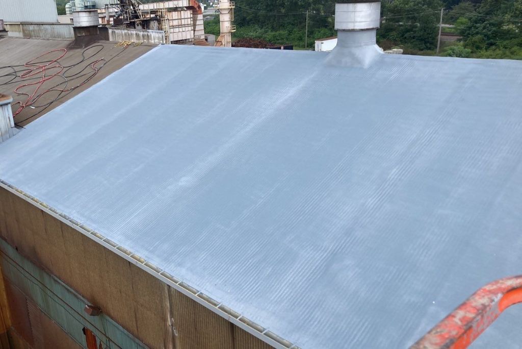 Steep Slope Metal Roof in Elyria, Ohio was restored with spray foam roofing
